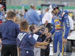 Defending NASCAR XFINITY Series Champion Chase Elliott with Children at Kentucky Speedway