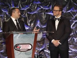 Speedway Children's Charities Vice Chairman Marcus Smith, right, listens as NASCAR driver Tony Stewart speaks during Wednesday's Sonic Automotive Speedway Children's Charities' Gala presented by The NRA Teach Freedom Foundation at the Ritz-Carlton in Charlotte, North Carolina. (CMS/HHP photo)