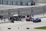 Two pace cars ready to take four more fans out onto the track. 